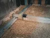 Construction site with leveling tools on gravel. Voir les images du produit