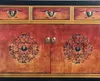 A close-up view of an ornate, vintage-style Asian sideboard or dresser. Produktbild-Vorschau