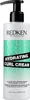 A product shot of a bottle of Redken Hydrating Curl Cream. Voir les images du produit