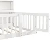A close-up view of a white wooden children's bed with a guardrail. Produktbild-Vorschau