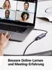 A person is using a laptop connected to an external network adapter, with a video conference displayed on the screen. Voir les images du produit