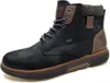 A single blue leather boot with brown accents and a gray fabric cuff, shown against a white background. Voir les images du produit