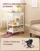 A kitchen cart with items on it, placed in a room with a chair and window. Produktbild-Vorschau