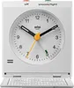 A white Braun alarm clock is shown in a studio setting with a white background. Voir les images du produit