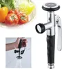A collage of images showing a kitchen sprayer, vegetables being washed, and a hand holding the sprayer with water flowing. Produktbild-Vorschau