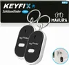 Two key finders are displayed on a white background, with packaging shown above. A small inset image shows one key finder attached to a key on a door. Produktbild-Vorschau