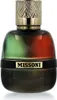 A perfume bottle with a gradient of green and red, a black band with the brand name, and a gold textured cap. Produktbild-Vorschau