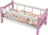 A doll's crib with bedding. Náhled obrázku produktu