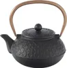 A black cast iron teapot with a copper handle and a floral embossed pattern. Produktbild-Vorschau
