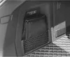 A close-up view of a black car trunk organizer with a mesh pocket and a first aid kit inside. Podgląd zdjęcia produktu