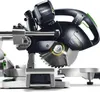 A close-up studio shot of a miter saw. Podgląd zdjęcia produktu