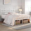 A white metal bed frame with a decorative headboard, dressed with pink bedding and a white throw blanket, is shown in a bedroom setting. Produktbild-Vorschau