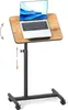 A portable laptop table with adjustable height and tilt, shown with a laptop on it. Podgląd zdjęcia produktu