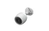 A white security camera with a black lens and blue accents, mounted on a white bracket, is shown against a white background. Voir les images du produit