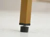 Close-up of the bottom of a furniture leg with an adjustable foot. Anteprima dell’immagine prodotto