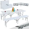 A white plastic folding table and two benches set, with drinks and lemons on the table. Náhľad obrázku produktu