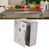 A split image showing a grill with a rotisserie skewer of vegetables and a close-up of a BBQ rotisserie motor. Náhled obrázku produktu