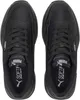 A top-down view of a pair of black Puma sneakers. Anteprima dell’immagine prodotto