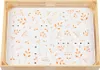 A wooden tray with a white insert featuring an orange botanical and musical note pattern. Produktbild-Vorschau