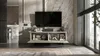 A modern living room with a TV stand, TV, and decorative items, next to a large window. Produktbild-Vorschau