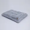 A light gray plush dog bed is shown from a side angle on a white background. Podgląd zdjęcia produktu