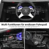Close-up view of the interior dashboard and steering wheel of a toy car, with labels pointing out various functions. Produktbild-Vorschau