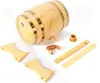 A wooden barrel with accessories laid out on a white background. Voir les images du produit