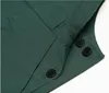 A close-up view of a dark green garment, showing buttons and seams. Anteprima dell’immagine prodotto