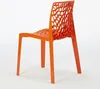 An orange chair with a patterned back and seat is shown against a white background. Produktbild-Vorschau