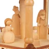 Close-up view of wooden nativity figures on a tiered platform. Produktbild-Vorschau
