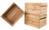 Two wooden crates are shown against a white background. One crate is tilted on its side, showing its interior. The other crate is stacked on top of another, forming a small stack. Produktbild-Vorschau