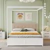 A bedroom scene featuring a white canopy bed with a beige upholstered headboard and yellow bedding. Produktbild-Vorschau