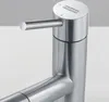 A close-up shot of a modern kitchen faucet. Anteprima dell’immagine prodotto