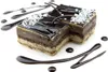 Two chocolate cakes with chocolate glaze and white sprinkles, decorated with chocolate sauce. Anteprima dell’immagine prodotto
