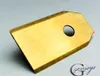 A close-up of a single gold-colored blade with a hole in the center, set against a light gray background. Produktbild-Vorschau