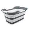 A collapsible laundry basket shown from a slightly elevated side angle against a white background. Anteprima dell’immagine prodotto