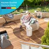 A woman relaxing on a lounge set on a wooden deck, with a dog nearby. Produktbild-Vorschau