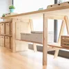 A wooden desk with storage boxes and plants. Anteprima dell’immagine prodotto