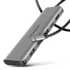 A silver USB-C hub with multiple ports is shown against a white background. Produktbild-Vorschau
