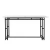 A white and black dining table with a marble-like top and a metal frame, shown against a white background. Anteprima dell’immagine prodotto