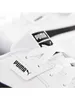 A close-up view of the front of a white Puma sneaker, showing the laces and branding. Voir les images du produit