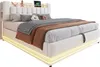 A white bed with a tufted headboard, pillows, and bedding, illuminated by LED lights around the base. Produktbild-Vorschau