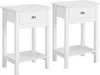 Two white bedside tables are shown against a white background. Produktbild-Vorschau