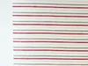 A close-up view of a striped fabric. Produktbild-Vorschau
