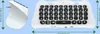 A white gaming keyboard with a headphone jack and dimensions shown. Produktbild-Vorschau