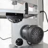 A close-up view of the motor and blade assembly of a bandsaw. Produktbild-Vorschau
