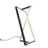 A modern LED table lamp with a black and gold frame, shown against a white background. Náhľad obrázku produktu