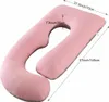 A pink U-shaped pregnancy pillow with dimensions indicated by measurement lines and text. Náhled obrázku produktu