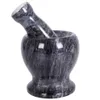 A granite mortar and pestle set on a white background. Voir les images du produit