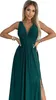 A woman wearing a dark green sparkly dress with a thigh-high slit. Produktbild-Vorschau
